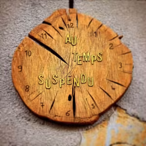 AU TEMPS SUSPENDU - logo